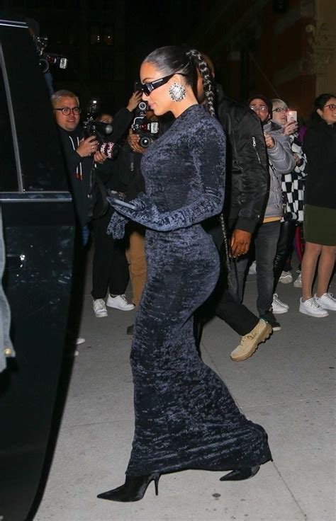 Kim Kardashian In A Black Form Fitting Dress Leaves Zero Bond In New