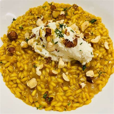 Risotto Alla Zucca Con Mousse Di Parmigiano Nocciole Tostate E Timo