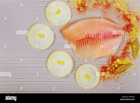 Raw Tilapia Fish Fillet Ready For Cooking Stock Photo Alamy