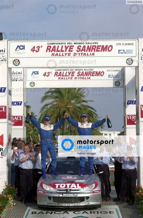 Gilles And Herve Panizzi Fra Peugeot Wrc Celebrate Victory