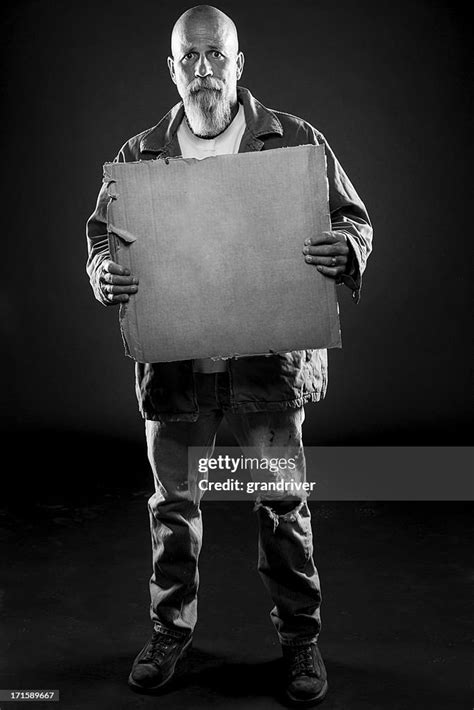 Homeless Man Begging With Cardboard Sign High Res Stock Photo Getty