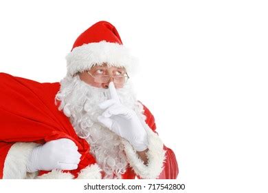 Full Length Portrait Of Real Santa Claus Carrying Big Bag Full Of