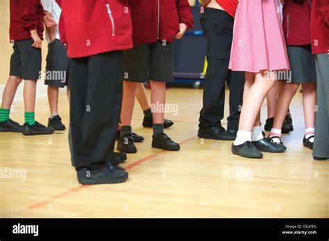 Group Of Primary School Children In An Assembly At Small English School
