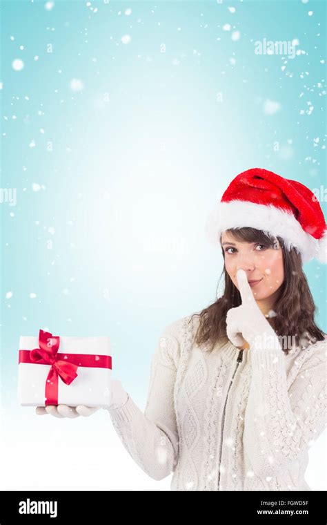 Festive Brunette Keeping A Secret Stock Photo Alamy