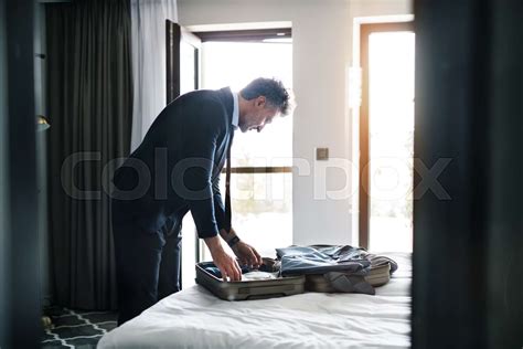 Mature Businessman In A Hotel Room Stock Image Colourbox