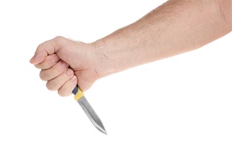 Mano Sostiene Un Cuchillo Sobre Un Fondo Blanco Una Plantilla Para