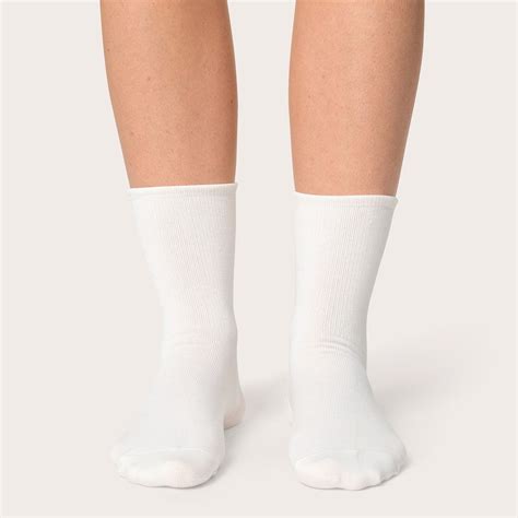 Download Free Image Of Woman Wearing Plain White Color Socks By