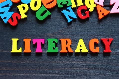 Premium Photo The Word Literacy With Colored Letters