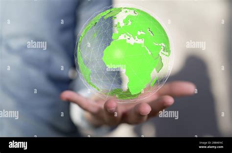 A Human Hand Holding The World In Hands Stock Photo Alamy