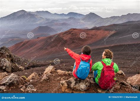 Hiking Travel Vacation in Maui Volcano, Hawaii. USA Travel Woman with Backpack Pointing at ...