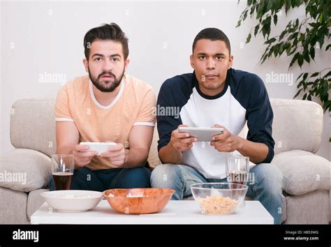 Happy Friends Playing Computer Games Stock Photo Alamy