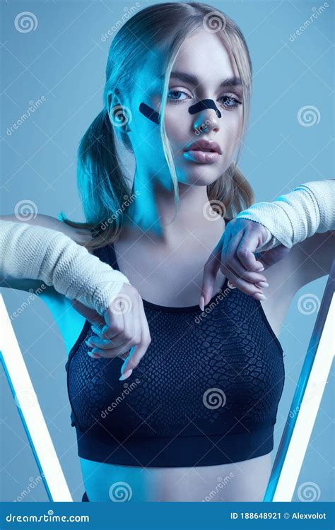 Strong Beautiful Girl With Blonde Hair Confident Look Fists In Protective Boxing Bandages