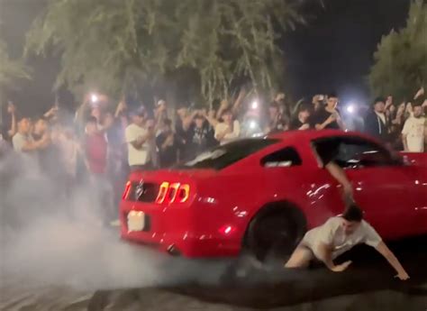 Watch Mustang Does Donuts Runs Over Spectator Strips Pants Off