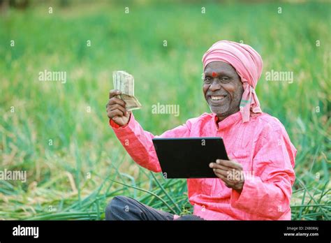 Indian Farmer Holding Tablet Stock Photo Alamy