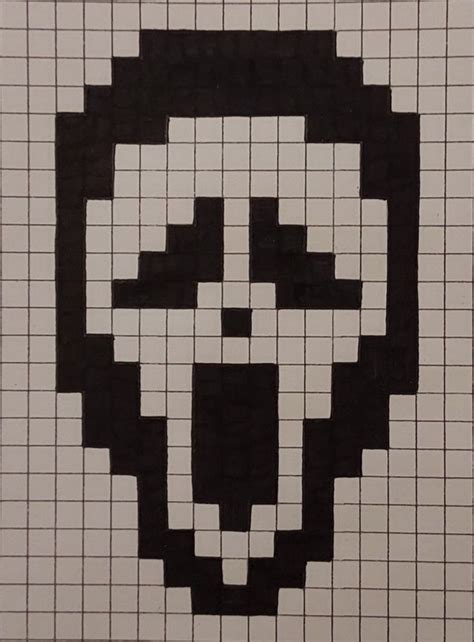 A Skull Made Out Of Black And White Squares Is Shown In The Shape Of A