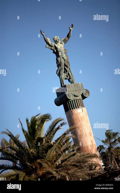 Statue Overlooking Levante Beach At Puerto Banus On The Costa Del Sol