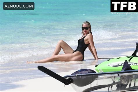 Khloe Kardashian Sexy Seen Showing Off Her Incredible Figure In A Black One Piece Bikini At The