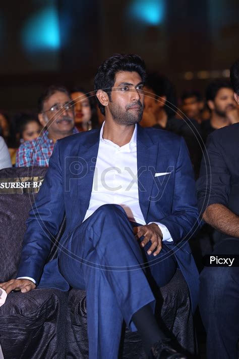 Image Of Tollywood Actor Rana Daggubati Wearing A Navy Color Suit