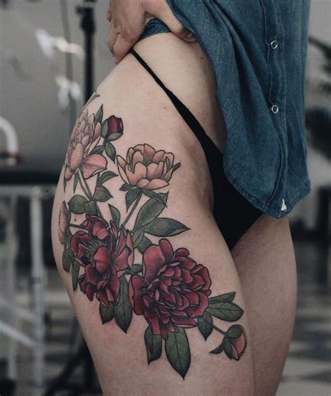 Flower Hip And Thigh Tattoos