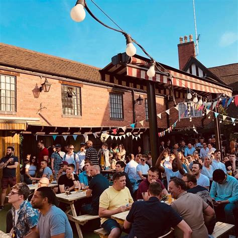 From Traditional English Pub Gardens To Lively Bars With Outdoor