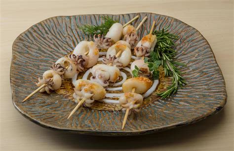 Grilled Cuttlefish On The Plate And Wooden Background 12270408 Stock