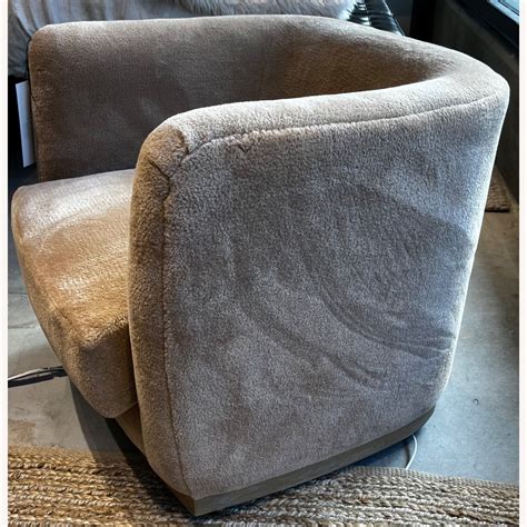 Pottery Barn Danton Faux Fur Swivel Chair AptDeco