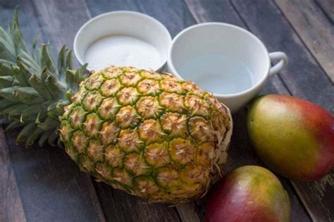 Frozen Pineapple Mango Vodka Slush Champagne And Coconuts