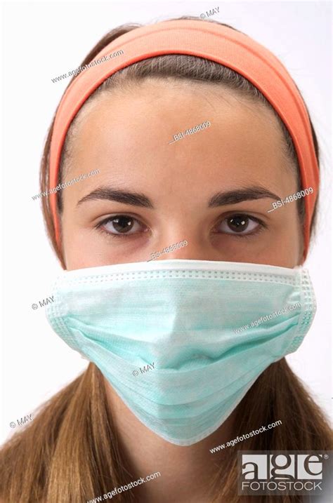 Teenage Girl Mask Of Prevention Against Swine Influenza H1n1 Stock