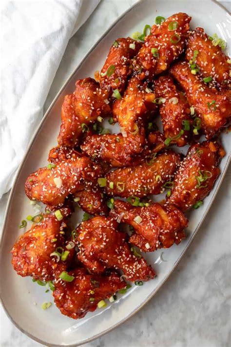 Spicy Honey Garlic Chicken Wings A Dash Of Dolly