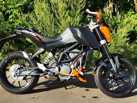 Купить б у KTM 200 Duke инжектор 6 передач в Москве оранжевый naked bike 2014 года на Авто ру