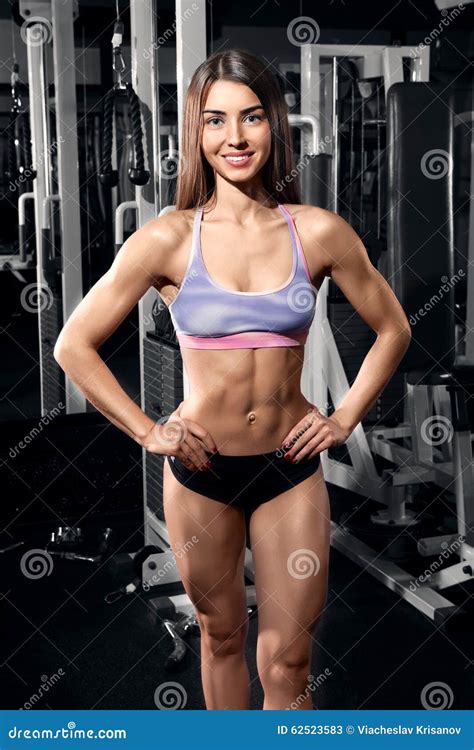 Two Smiling Athletic Women Doing Aerobic Dancing Exercises Holding ...