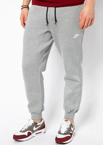 Спортивные мужские штаны Nike (41 фото): зауженные, с резинкой внизу, с ...