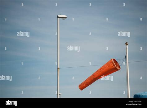 A Windsock On The Coast To Help Gauge Wind Speed And Direction For A