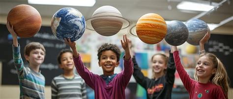 Students With A Solar System Diorama In The Classroom Premium AI