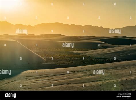 Harsh desert sunset Stock Photo - Alamy