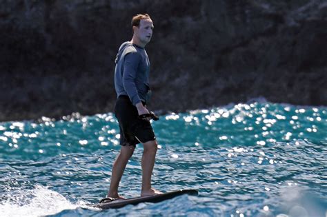 Mark Zuckerberg surfboards in Hawaii with way too much sunscreen