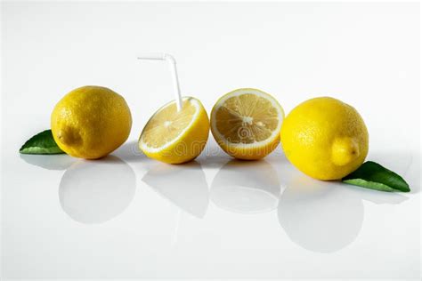 Fresh Yellow Lemon With Green Leaf On White Background Stock Image