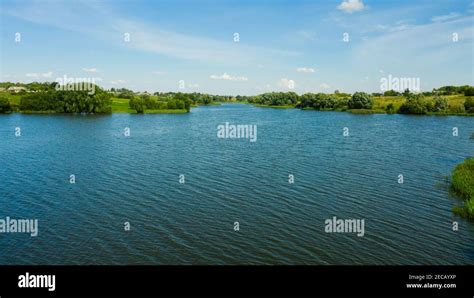 Scenic Aerial View Of River And Green Fields In Russian Countryside