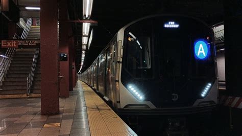 Fulton Street Line R211 A Express Train Arriving And Departing Utica