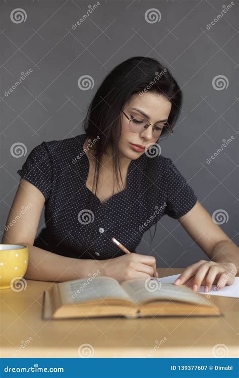 Beautiful Young Woman In Glasses Reading A Book Stock Image Image Of