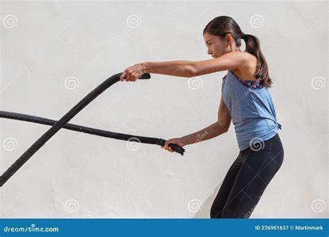 Fitness Woman Training Battle Ropes Workout At Gym Girl Working Out