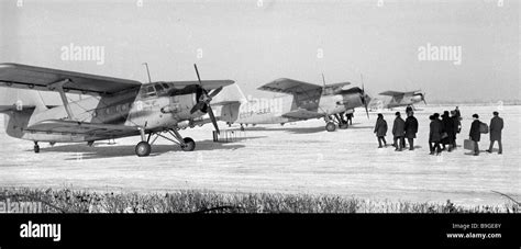 Passengers boarding an An 2 plane at Vinnitsa Airport Stock Photo - Alamy