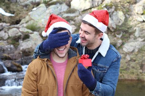 Gay Man Receiving A Christmas Surprise Stock Photo Image Of Giving Boyfriend