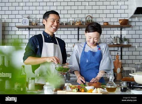 Japanese Mature Couple In The Kitchen Stock Photo Alamy