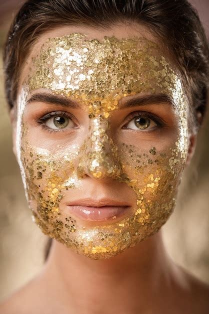 Premium Photo Beautiful Woman With Golden Shining Mask On Her Face