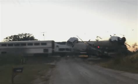 Amtrak Train Crashes Into Semi Truck Hauling Cars Sending Vehicles