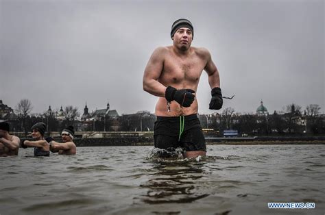 Enthusiasts Stay In Ice Cold Waters Of Vistula River In Warsaw Poland