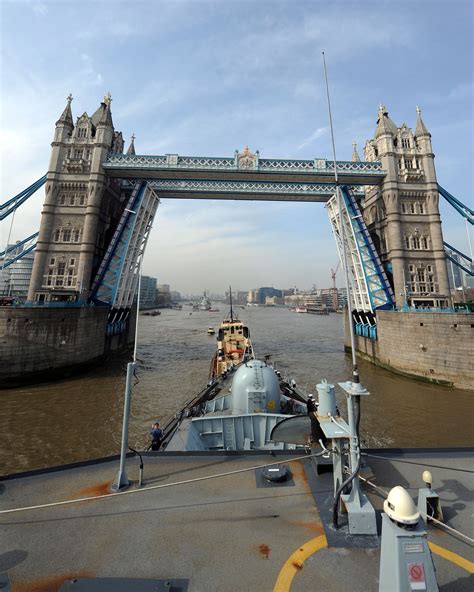 HMS St Albans passes Tower Bridge as she departs London 22/03/2012 HMS St Albans sailed from ...