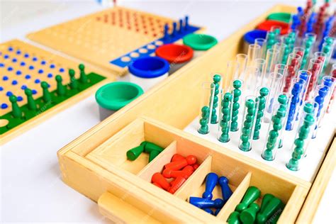 Premium Photo Detail Of Pins And Beans On A Montessori Board To