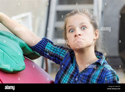 A Young Girl Making Funny Faces Stock Photo Alamy